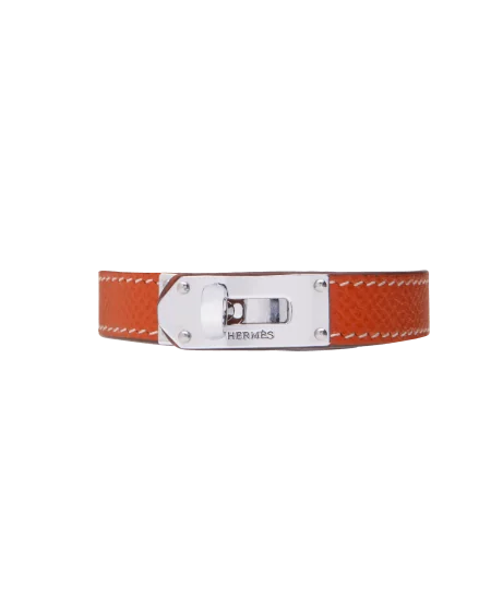 奢侈品牌爱马仕（Hermès）钢制搭配橙色皮革手链。在 VIRTU LUXURY 有售。